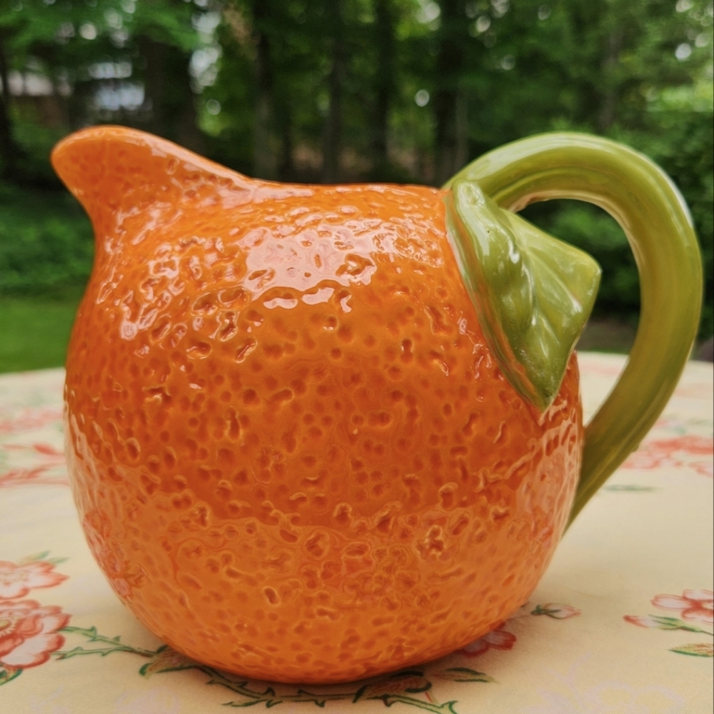 Vintage Ceramic Orange Pitcher with leaves